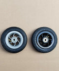 Five Inch Pneumatic Tire With Inner Tube And Heavy Duty Steel Hub Featuring 5X1 Bolt Pattern For Go Kart And Caster Wheels, side view.