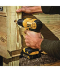 Heavy Duty 20V Max Lithium Ion Cordless Drill Driver Kit Featuring Rock Solid 1/2 Inch Chuck And Hella Compact Ergonomics Delivering Serious Torque For Pure Job Site Flex Renewed drilling into wooden board