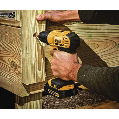 Heavy Duty 20V Max Lithium Ion Cordless Drill Driver Kit Featuring Rock Solid 1/2 Inch Chuck And Hella Compact Ergonomics Delivering Serious Torque For Pure Job Site Flex Renewed drilling into wooden board