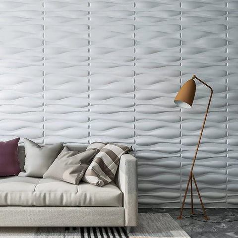 White 3D Wall Panels Dope Wave Design PVC Waterproof Paintable Durable Plastic Accent Wall Tiles behind a modern sofa.