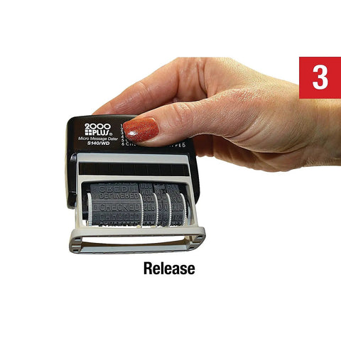 Hand demonstrating the release feature of the Slick Self Inking Micro Message Dater Stamp With Quick Flip Phrases.
