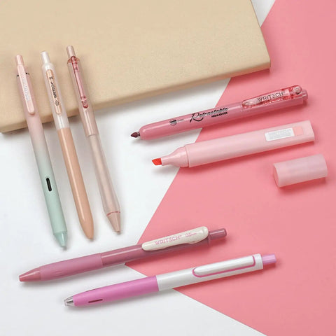 Gel Pen And Highlighter Journal Set Featuring A 7 Piece Assortment Of Pastel And Neutral Colors Displayed On Pink Background