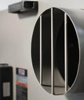 Heavy Duty Portable Metalworking Dust Collector Crushing Sawdust Clutter At 957 CFM exhaust vent with metal grilles.