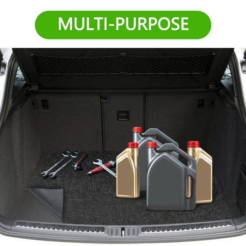 Heavy Duty Garage Floor Mat 32 By 64 Inch absorbs oil and grease, shown in a car trunk with tools and oil containers on top.