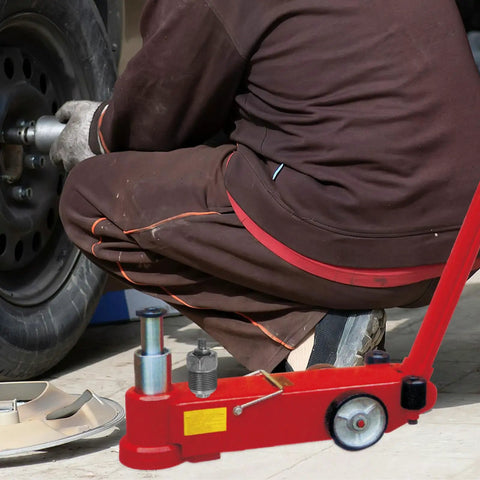 Beefy Heavy Duty Hydraulic Horizontal Jack Accessory With Pressure Relief Valve For Construction Sites And Auto Repair, Durable Metal Build, Easy Install Spare Part, red metal floor jack accessory on vehicle wheel