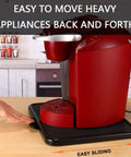 Red coffee maker on a Sliding Kitchen Appliance Caddy Tray with Wheels for Under Cabinet and Countertop Storage