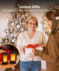 Woman receiving a gift with Lit Real Flame Solar Lanterns With USB Charging Four Modes Waterproof Outdoor Lights in background