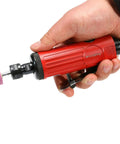 Shop Grade 1/4 Inch Pneumatic Straight Die Grinder With 22000 RPM Rapid Spin in hand with pink polishing bit attached.