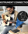 Man playing guitar connected to USB Audio Interface For PC With Touch Model 16 Bit 48 kHz Audio Quality DSP Effects 48V Phantom Power XLR Input