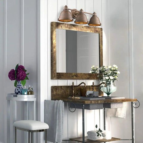 Bartlett Bath Vanity with Copper Patina Finish, Industrial Vintage Vibe above wooden sink, mirror, and flowers
