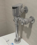 1.6 GPF Top Mount Exposed Sensor Flush Valve For Toilet With Gear-Driven Ceramic Cartridge Hardwired With Battery Backup And On-Demand Manual Flush For No Fuss Performance, chrome wall-mounted toilet flush valve