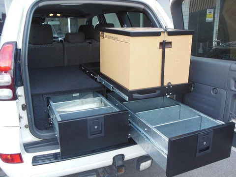 Heavy Duty 30 Inch Drawer Slides With Full Extension Ball Bearing Stainless Steel Side Mount Or Undermount 260 Lb Capacity Screws Included Quiet Smooth Operation exposed in a vehicle trunk showcasing storage benefits.