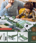Father and son assembling Hands-On DIY Model Airplane Kit With 285 Metal Parts, Fighter Jet STEM Building Project on table.