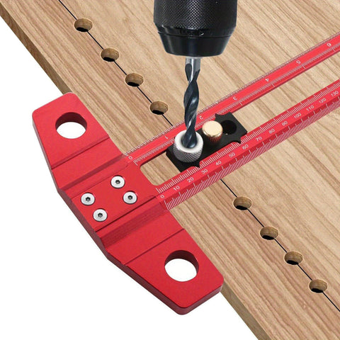 Double Scale T Square Ruler Aluminum Measuring Tool for Inches and Metric in use with drill on wooden board