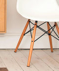 Four Pack Brown Rubber Furniture Foot Pads For Chair And Table Legs Non Slip Round Protectors Easy To Install Reduces Friction On Hardwood Floors Keeps Floors Quiet And Scratch Free visible on chair legs.