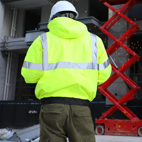 Reflective Hi Vis Bomber Jacket For Men, Waterproof Construction Safety Coat with black bottom, back view, work setting