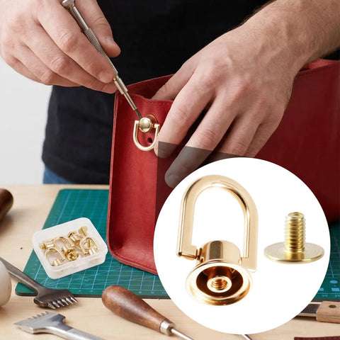 Premium Heavy Duty D Rings And Screws For Purses Shiny Gold Metal Rivets being installed on a red bag during crafting.