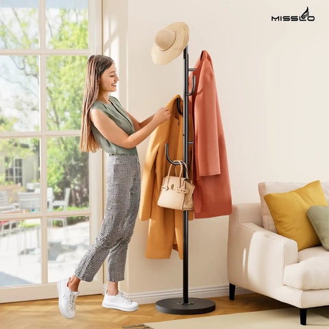 Heavy Duty Freestanding Coat Rack With Solid Wood Base And Metal Coat Tree 6 Hook Hanger Stand For Jackets Hats Bags No Wobble Sturdy Standing Purse Rack For Bedroom Or Office in a living room