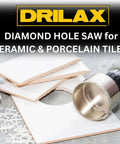 Drilax diamond hole saw, 2-3/4-inch diameter with diamond edge, mounted on a drill beside ceramic tiles