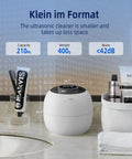Cordless Ultrasonic Retainer Cleaner With 48kHz Vibration, 210ml Tank, shown on bathroom counter next to toiletries.