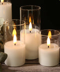 Clear Glass Flameless Candles With Remote Set Of 5 Slim Tall LED Pillar Candles Battery Powered Assorted Sizes on wood table