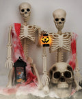 Two-Pack 36 Inch Pose N Stay Skeleton Decorations For Haunted House Halloween Decor with lantern and skull props