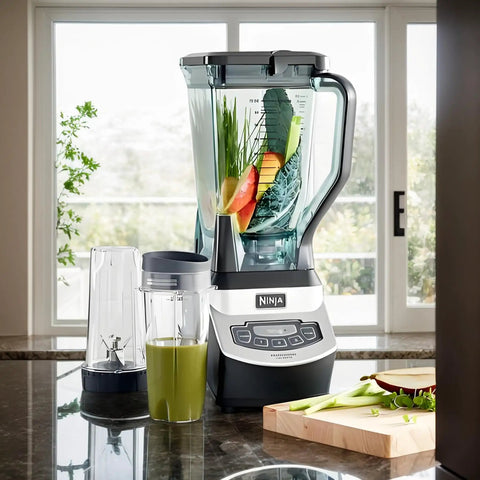 Black Ninja blender on kitchen counter with smoothie ingredients and replacement blender blade for Ninja fits Nutri Ninja Auto IQ