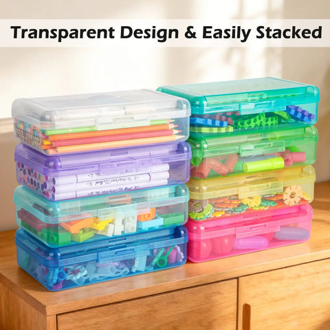 Stacked clear pencil cases filled with supplies on a desk, featuring double layer clear hard pencil case with snap tight lid.