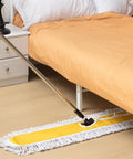 Pro Grade Heavy Duty 2 Pack Industrial Dust Mops With Swivel Heads And Extended Handles For No Fuss Commercial Floor Sweeping On Hardwood Tile And Marble Floors, showing yellow dust mop under bed.