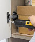 Using Cordless Screwdriver Rechargeable Compact Electric Screwdriver With Type-C Charging on cabinet hinge inside cupboard