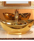 Countertop Bathroom Sinks Ceramic Wash Basin golden sink with elegant curves and faucet, perfect for modern bathroom design.