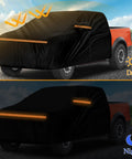 Kistrba mid-size crew-cab truck cover; black fabric with orange reflective stripes; full cover.