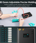 Man using 80 Level Adjustable Portable Spot Welder With LCD Screen Built In 6000mAh Battery 5m Nickel Cable And 4X4 Holders