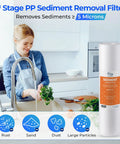 Woman in kitchen with NSF Certified 2-Year Replacement Filter Cartridge Pack For Standard 5-Stage RO Systems, 15-Piece White Set