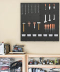 Black Plastic Pegboard Wall Organizer Panels, 4 Pack of 17.5x17.5 Inches, Stand Off Design mounted in workshop with tools.