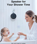 Cycling Bluetooth Speaker For Bike With IP65 Waterproof Build installed in a bathroom, mother and child in a bathtub with bubbles.