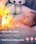 Sleeping baby with Unicorn Night Light For Kids With Sound Machine, 16 Color Silicone Baby Night Lamp USB Rechargeable Portable Bedroom Decor