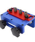 Straight Shooting Wood Dowel Drilling Guide 3 In 1 Jig Kit with a blue aluminum base and red positioner for precise drilling.