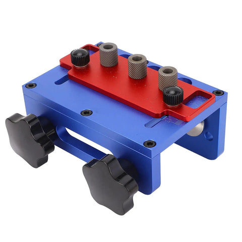 Straight Shooting Wood Dowel Drilling Guide 3 In 1 Jig Kit with a blue aluminum base and red positioner for precise drilling.