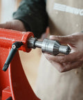 Person holding Revolving Live Center MT2 Three Quarter Inch Diameter For Woodturning Lathe Tailstock Center Between Centers 2MT Compatible