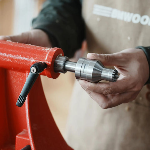 Person holding Revolving Live Center MT2 Three Quarter Inch Diameter For Woodturning Lathe Tailstock Center Between Centers 2MT Compatible