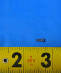Top Shelf S930 Indexable Insert Screw For Cnc Machining Tools, showing compact size against a measuring tape for precision.