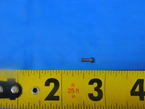 Top Shelf S930 Indexable Insert Screw For Cnc Machining Tools, showing compact size against a measuring tape for precision.