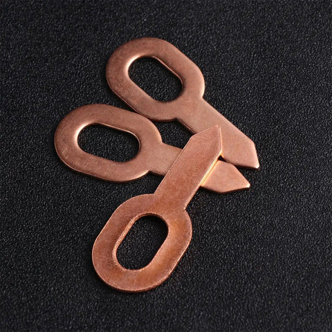 Awesome 50 Pcs Aluminum Sheet Metal Repair Kit With Smooth Edges And Ergonomic Design Golden Welding Pull Clamps For Car Bodywork And Machine Parts Fixin Job showing three golden welding pull clamps on a black surface.