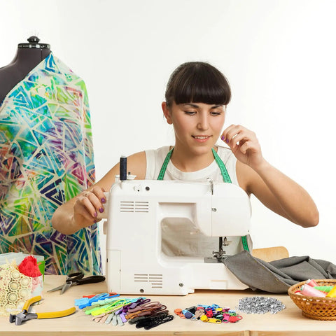 Woman sewing with machine, Easy Fix Zipper Repair Kit With 373 Pieces Including Colorful Sliders Replacement Zipper Pulls Stops visible nearby.
