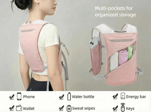 Grab And Go Hydration Running Vest For Men And Women With 500ml Soft Flask, pink vest with multi-pocket storage and adjustable straps.