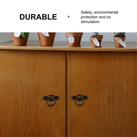 Vintage Cabinet Handles And Antique Drawer Pulls Set with plants on wooden cabinet top