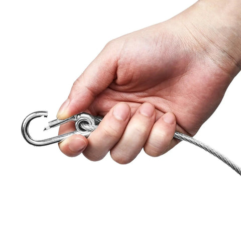 Close-up of hand holding Stage Lights Safety Cables Pack Of 10 Beefy Stainless Steel Cables for DJ Lights with carabiner