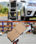 2-In-1 Folding Hand Truck And Dolly Platform Cart Convertible For Heavy Duty Lifting 500-700 Lb Capacity With All Terrain Rubber Wheels And Smooth Ride Switch Between Vertical And Flat Modes, shown folded and loaded