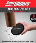 Heavy Duty Furniture Sliders For Carpet, Reusable Moving Pads Help You Slide Heavy Couches Across Rugs Without Breaking A Sweat, Non Adhesive Glides For Beds And Recliners, Beige 8 Piece Kit Moves Furniture Like A Champ showing 7-inch round slider applied under furniture leg.